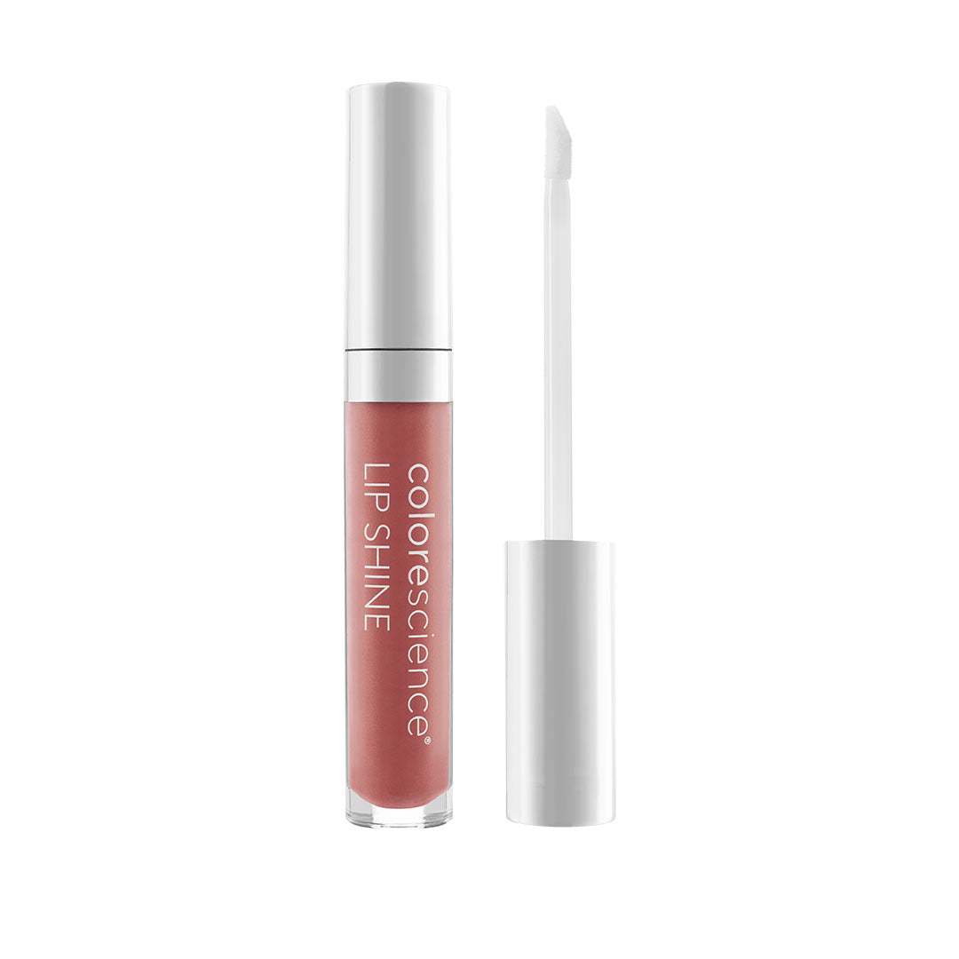 Lip Shine SPF 35 nourishing lip gloss with peptides, hyaluronic acid, and vitamin E antioxidants in pink shade with applicator.