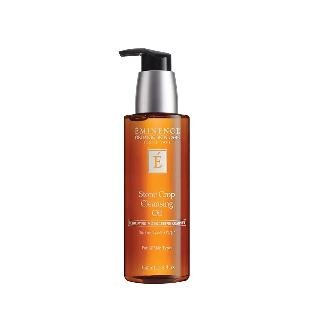 Amber 150ml pump bottle of Eminence Stone Crop Cleansing Oil with white label and black dispenser top.