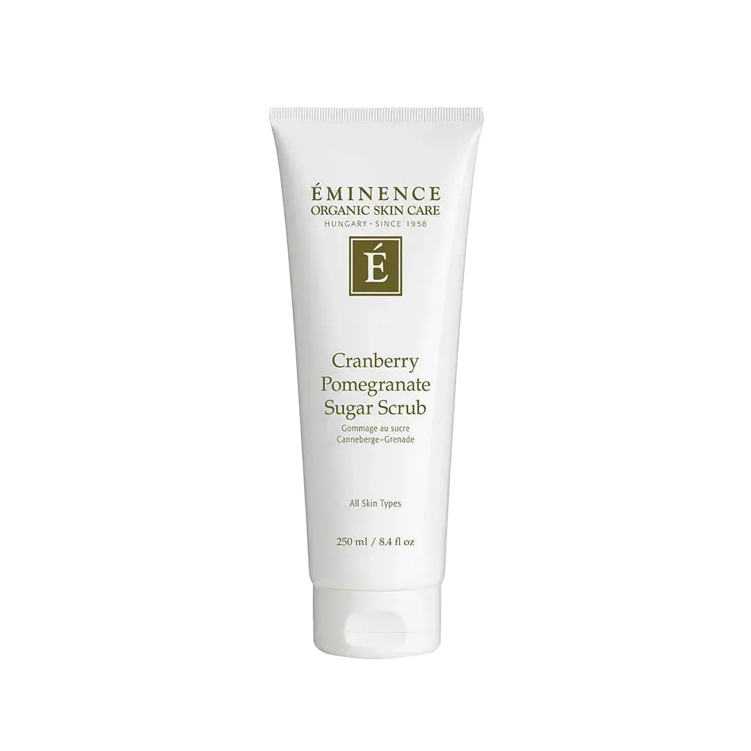 8.4 oz white squeeze tube of Eminence Cranberry Pomegranate Sugar Scrub with dark green branding and text.